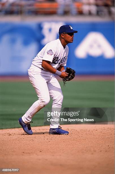 Cesar Izturis of the Los Angeles Dodgers fields against the San Francisco Giants at Dodger Stadium on April 2, 2002 in Los Angeles, California.
