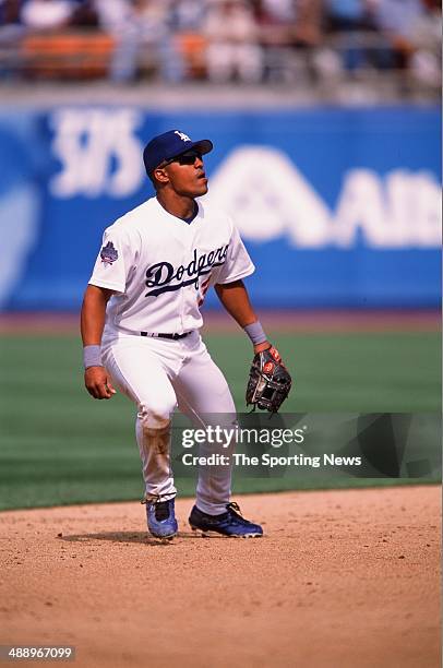 Cesar Izturis of the Los Angeles Dodgers fields against the San Francisco Giants at Dodger Stadium on April 2, 2002 in Los Angeles, California.