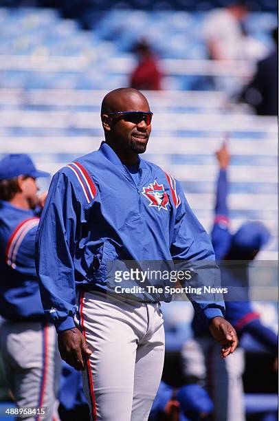 Carlos Delgado of the Toronto Blue Jays looks on against the New York Yankees at Yankee Stadium on April 30, 2000 in the Bronx borough of New York...