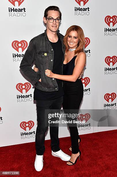 Musician Christopher French and actress Ashley Tisdale attend the 2015 iHeartRadio Music Festival at MGM Grand Garden Arena on September 18, 2015 in...