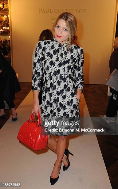 Olivia Cox attends the Paul Costelloe presentation during London Fashion Week Spring/Summer 2016/17 on September 18, 2015 in London, England.