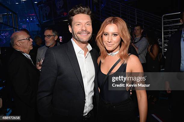 Ryan Seacrest and Ashley Tisdale attend the 2015 iHeartRadio Music Festival at MGM Grand Garden Arena on September 18, 2015 in Las Vegas, Nevada.