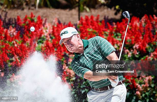 Jeff Maggert of the United States plays a bunker shot on the fourteen hole during the second round of THE PLAYERS Championship on The Stadium Course...