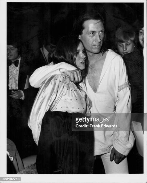 Actors Barbara Hershey and David Carradine hugging each other at the 31st Golden Globe Awards, California, January 26th 1974.