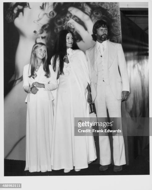 Actor Kris Kristofferson with his wife Rita Coolidge and their daughter Tracy, attending the premiere of the movie 'A Star is Born', December 1976.