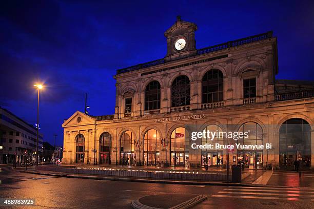 night view of lille flandres train station - france lille stock pictures, royalty-free photos & images