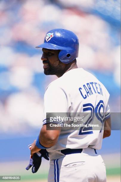 Joe Carter of the Toronto Blue Jays looks on against the Chicago White Sox at Comiskey Park in Chicago, Illinois on May 22, 1996. The White Sox...