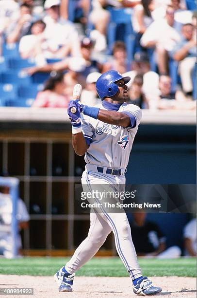 Carlos Delgado of the Toronto Blue Jays bats against the Chicago White Sox at Comiskey Park in Chicago, Illinois on May 22, 1996. The White Sox...