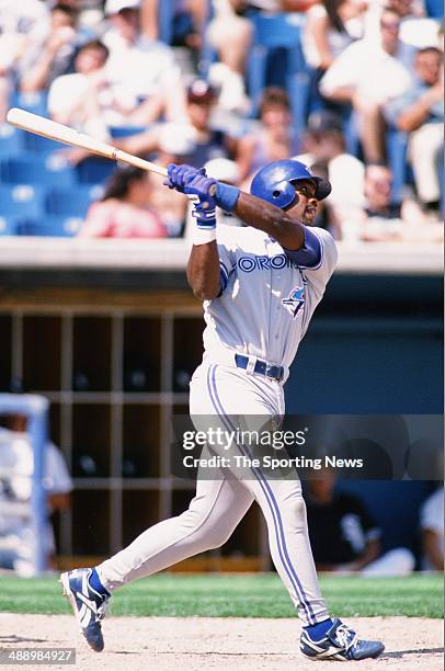 Carlos Delgado of the Toronto Blue Jays bats against the Chicago White Sox at Comiskey Park in Chicago, Illinois on May 22, 1996. The White Sox...