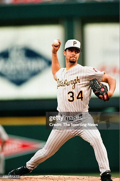 Esteban Loaiza of the Pittsburgh Pirates pitches against the St. Louis Cardinals at Busch Stadium on July 3, 1997 in St. Louis, Missouri. The Pirates...