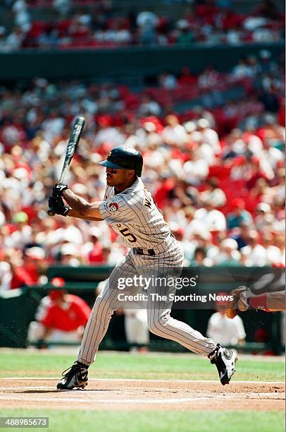 Tony Womack of the Pittsburgh Pirates bats against the St. Louis Cardinals at Busch Stadium on July 3, 1997 in St. Louis, Missouri. The Pirates...