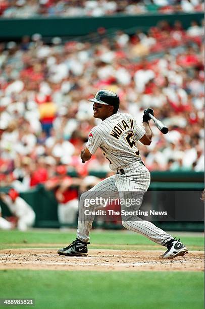 Tony Womack of the Pittsburgh Pirates bats against the St. Louis Cardinals at Busch Stadium on July 3, 1997 in St. Louis, Missouri. The Pirates...