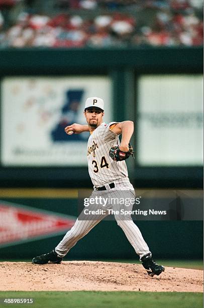 Esteban Loaiza of the Pittsburgh Pirates pitches against the St. Louis Cardinals at Busch Stadium on July 3, 1997 in St. Louis, Missouri. The Pirates...