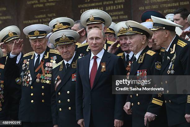 Russian President Vladimir Putin attends a military parade on May 9, 2014 in Sevastopol, Russia. Putin is having a one-day visit to Crimea which...