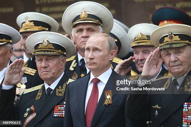 Russian President Vladimir Putin attends a military parade on May 9, 2014 in Sevastopol, Russia. Putin is having a one-day visit to Crimea which...