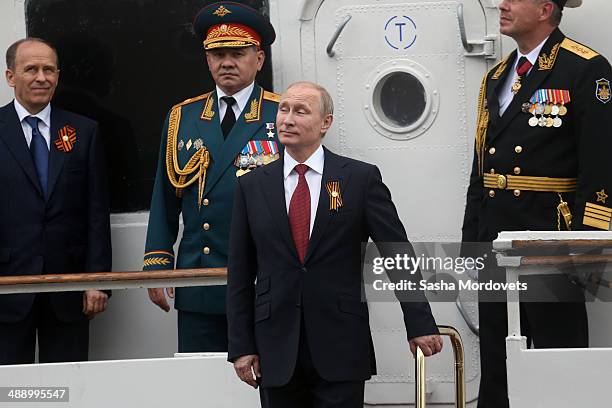 Russian President Vladimir Putin attends a military parade on May 9, 2014 in Sevastopol, Russia. Putin is having a one-day visit to Crimea which...