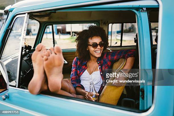 girl barefoot in the car - african american woman barefoot stock pictures, royalty-free photos & images