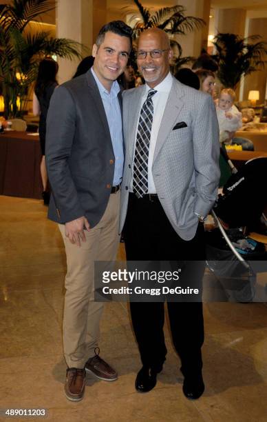 Cash Warren and dad Michael Warren arrive at The Helping Hand of Los Angeles Mother's Day luncheon at The Beverly Hilton Hotel on May 9, 2014 in...