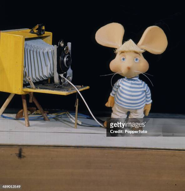 Portrait of the childrens' puppet show character Topo Gigio featured with a camera on television in 1967.