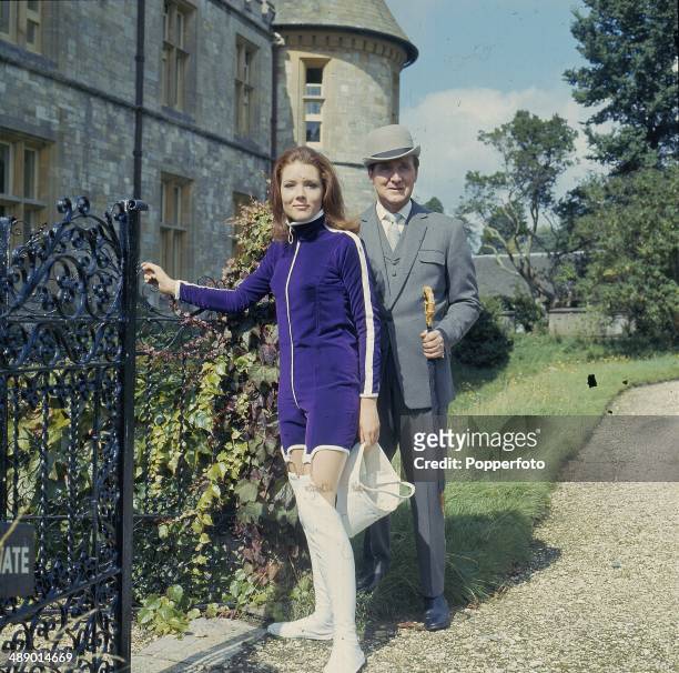 English actress Diana Rigg and English actor Patrick Macnee as 'Emma Peel' and 'John Steed' posed at Beaulieu on the set of the television series...
