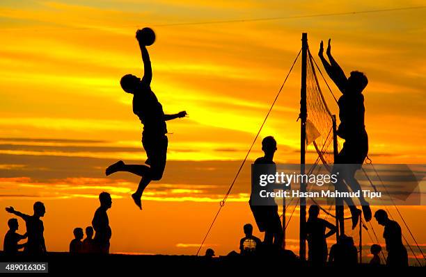 crazy summer fun - beach volleyball stock pictures, royalty-free photos & images