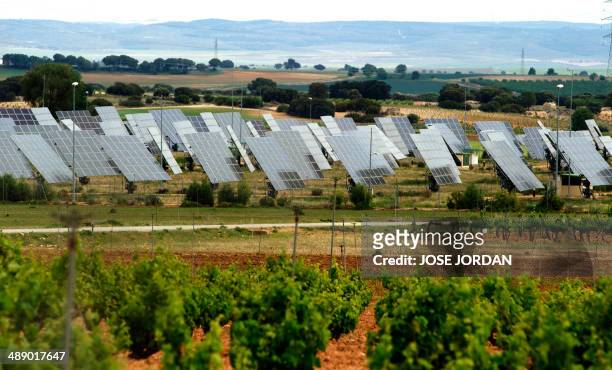 Field of solar panels is seen in Mahora, near eastern Spanish city of Albacete on May 7, 2014. Spanish people who installed solar panels are facing...