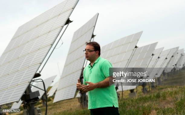 Spanish investor in solar energy David Utiel speaks during an interview in a field of solar panels in Mahora, near eastern Spanish city of Albacete...