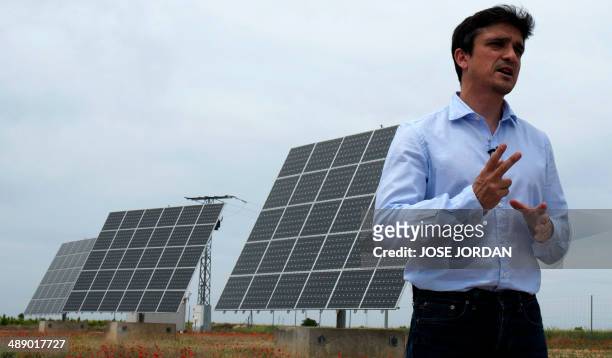 Spanish investor in solar energy Manuel Alonso Caballero speaks during an interview in a field of solar panels in Mahora, near eastern Spanish city...