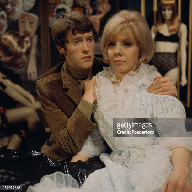 English actor Michael Crawford pictured with actress June Barry in a scene from the television drama 'The Three-Barrelled Shotgun' in 1967.
