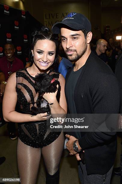 Singer Demi Lovato and actor Wilmer Valderrama attend the 2015 iHeartRadio Music Festival at MGM Grand Garden Arena on September 18, 2015 in Las...