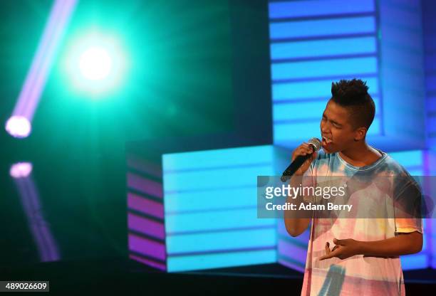 Daniyom Mesmer, winner of the competition, performs at the second-season finale for the German version of 'The Voice Kids' singing contest, on May 9,...