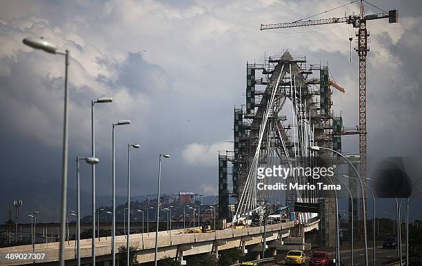 Work continues on the TransCarioca BRT bridge, which crosses Guanabara Bay, on May 9, 2014 in Rio de Janeiro, Brazil. The TransCarioca is part of the...