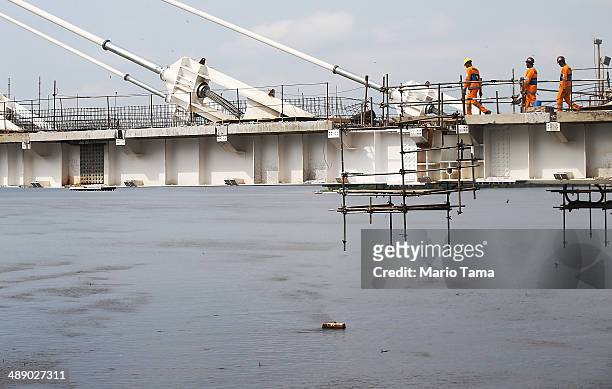 Work continues on the TransCarioca BRT bridge, which crosses Guanabara Bay, on May 9, 2014 in Rio de Janeiro, Brazil. The TransCarioca is part of the...