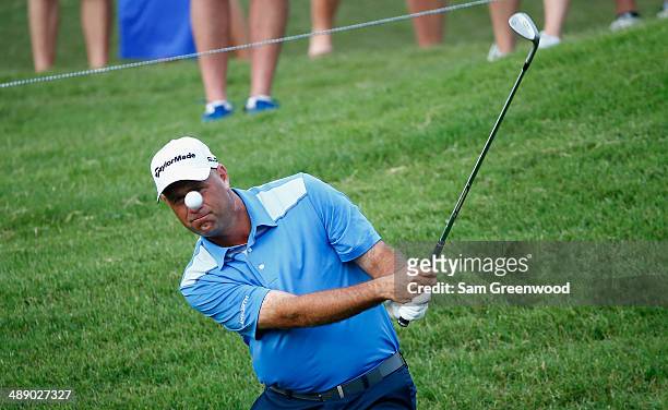 Stewart Cink of the United States plays a bunker shot on the ninth hole during the second round of THE PLAYERS Championship on The Stadium Course at...