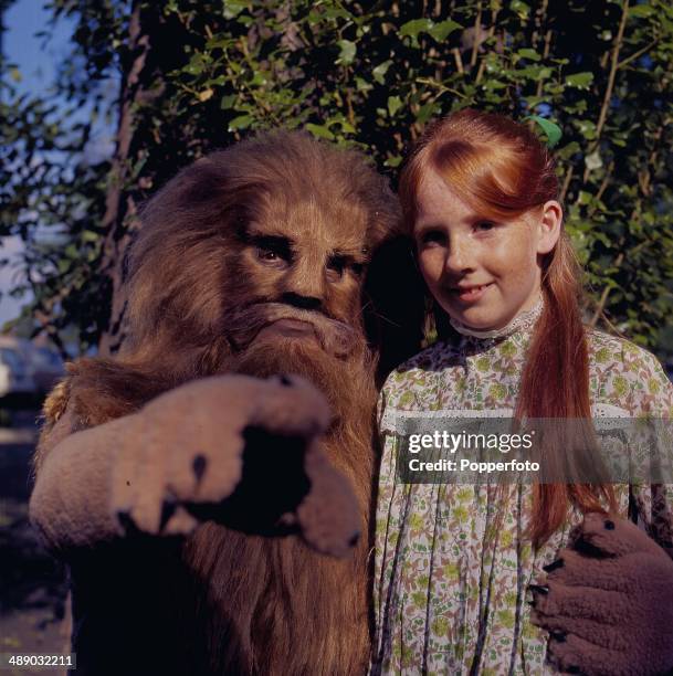 Actress Liz Crowther as 'Lucy' and Bernard Kay as 'Aslan' the lion on the set of the 1967 television production of 'The Lion, The Witch and the...