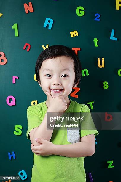 cute asia children - number magnet stock pictures, royalty-free photos & images