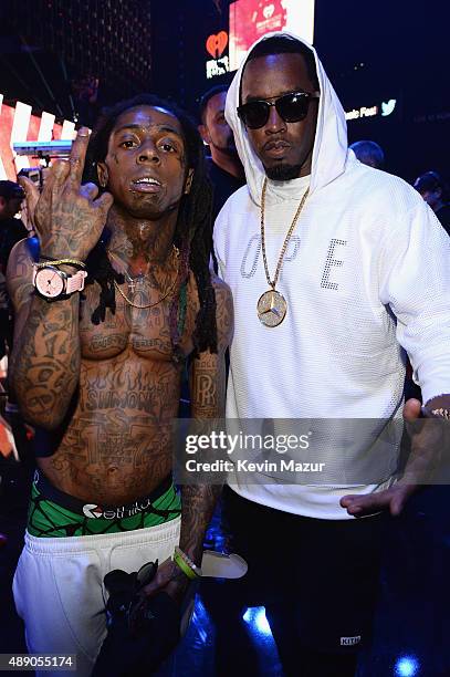 Rappers Lil Wayne and Sean Combs attend the 2015 iHeartRadio Music Festival at MGM Grand Garden Arena on September 18, 2015 in Las Vegas, Nevada.