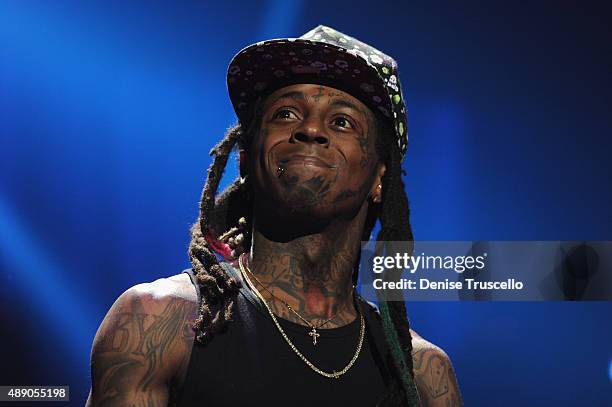 Rapper Lil Wayne performs onstage at the 2015 iHeartRadio Music Festival at MGM Grand Garden Arena on September 18, 2015 in Las Vegas, Nevada.