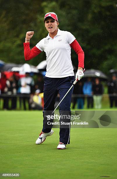 Lexi Thompson of team USA celebrates holeing her putt during the continuation of the afternoon fourball matches at The Solheim Cup at St Leon-Rot...