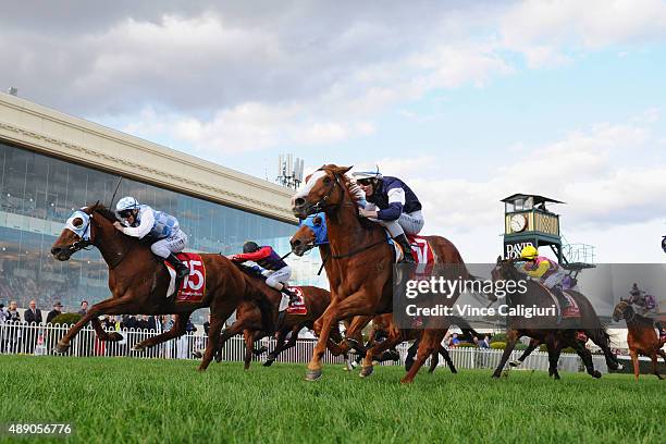 Luke Currie riding Magnapal defeats Damian Lane riding The United States in Race 8, MRC Foundation Cup during Melbourne Racing at Caulfield...