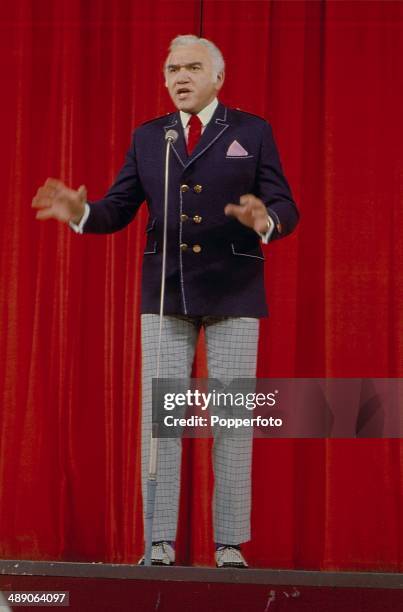 Canadian actor and singer Lorne Greene performs on stage at the Palladium Show in London in 1968.