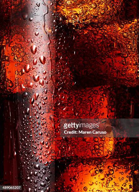 close up of soda and ice - 結露　ガラス ストックフォトと画像
