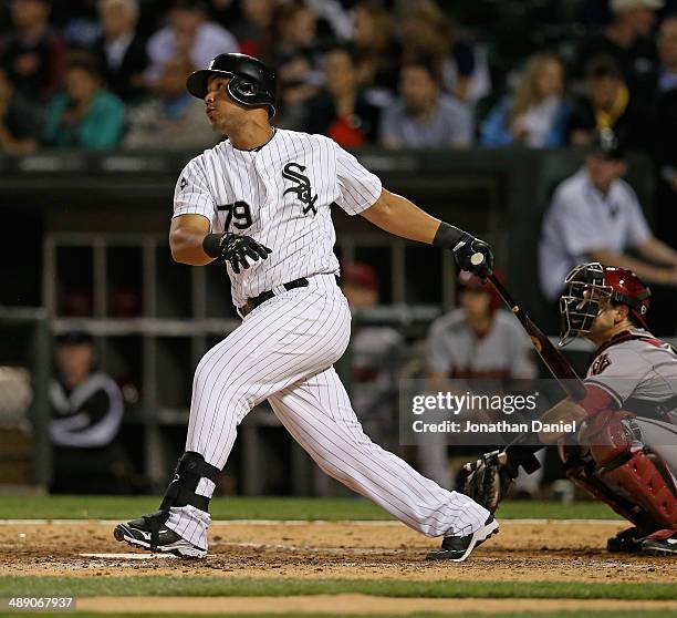 Jose Abreu of the Chicago White Sox hits a solo home run in the 7th inning against the Arizona Diamondbacks at U.S. Cellular Field on May 9, 2014 in...