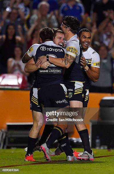 Michael Morgan of the Cowboys celebrates after scoring a try during the Second NRL Semi Final match between the North Queensland Cowboys and the...