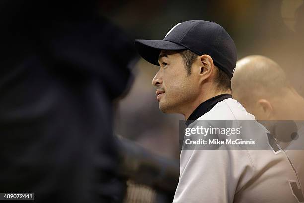 Ichiro Suzuki of the New York Yankees watches the interleague game from the dugout during the fourth inning against the Milwaukee Brewers at Miller...