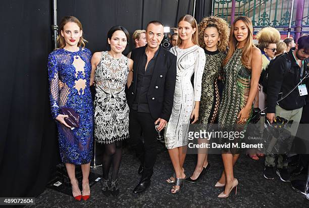 Rosie Fortescue, Andrea Corr, Julien MacDonald, Millie Mackintosh, Ella Eyre and Rochelle Humes attend the Julien MacDonald Spring/Summer 2016...