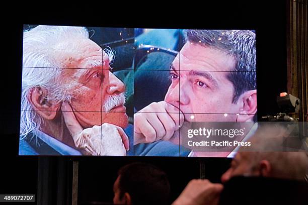 Video wall the showing of Manolis Glezos and Alexis Tsipras .