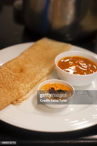 Plate of dosa, a pancake of fermented rice and black lentils, in India.