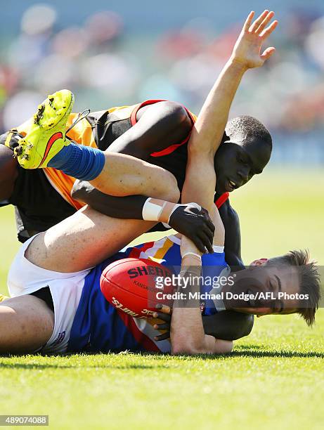 Thomas Jok of the Stingrays tackles Jordan Gallucci of the Ranges during the TAC Cup Semi Final match between Dendenong Stingrays and Eastern Ranges...