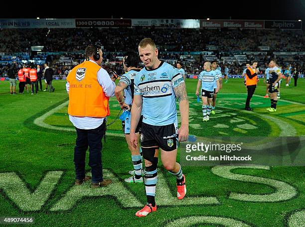 Luke Lewis of the Sharks looks dejected after losing the Second NRL Semi Final match between the North Queensland Cowboys and the Cronulla Sharks at...